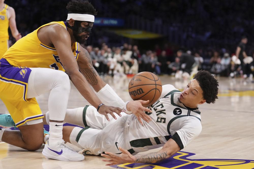 强调防守与 强调防守与